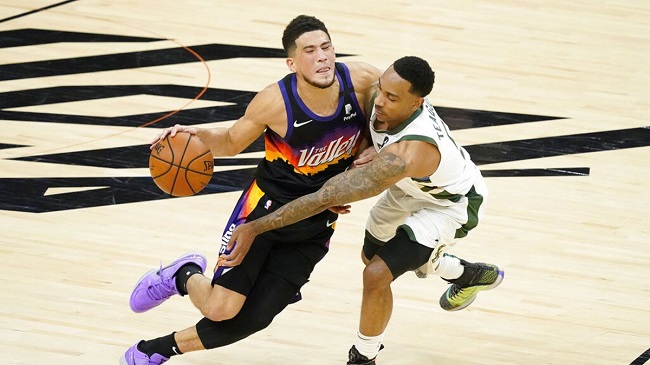 N.B.A. Finals Booker Leads Suns Over Bucks in Game 2